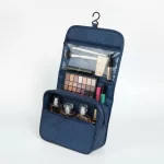⁦حقيبة تنظيم مستحضرات التجميل والأدوات الشخصية لون ازرق غاق⁩ - الصورة ⁦2⁩