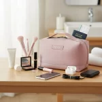 ⁦حقيبة يدوية متعددة الاستخدام لتنظيم أدوات السفر لون وردي⁩ - الصورة ⁦2⁩