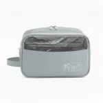 حقيبة مستلزمات التجميل لون رمادي مع واجهة شفافة